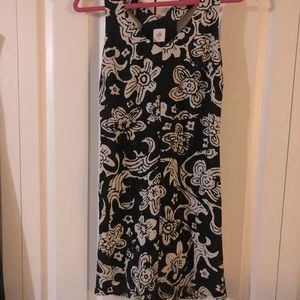 Cute summer t-back dress. Shorter in the front. A little longer in the back.